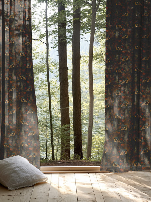 A sheer curtain panel featuring a repeating pattern of amber and forest green peacocks with botanical fan motifs on a dark background, creating a sophisticated Victorian gothic design.